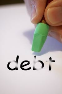 Image of the word “debt” being erased, to illustrate the complex relationship between bankruptcy and divorce and how an NJ divorce attorney can help
